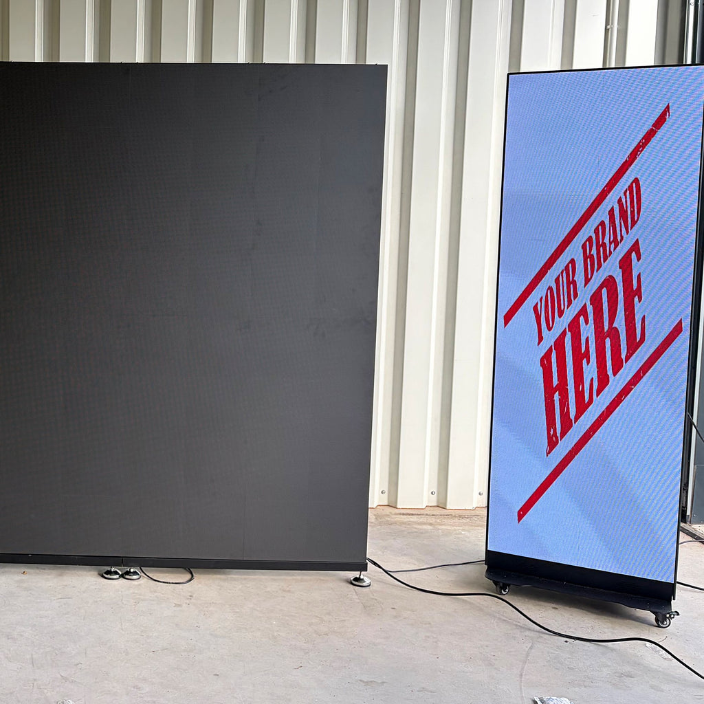 LED screen poster showing “Your Brand Here” next to an LED wall in the hall